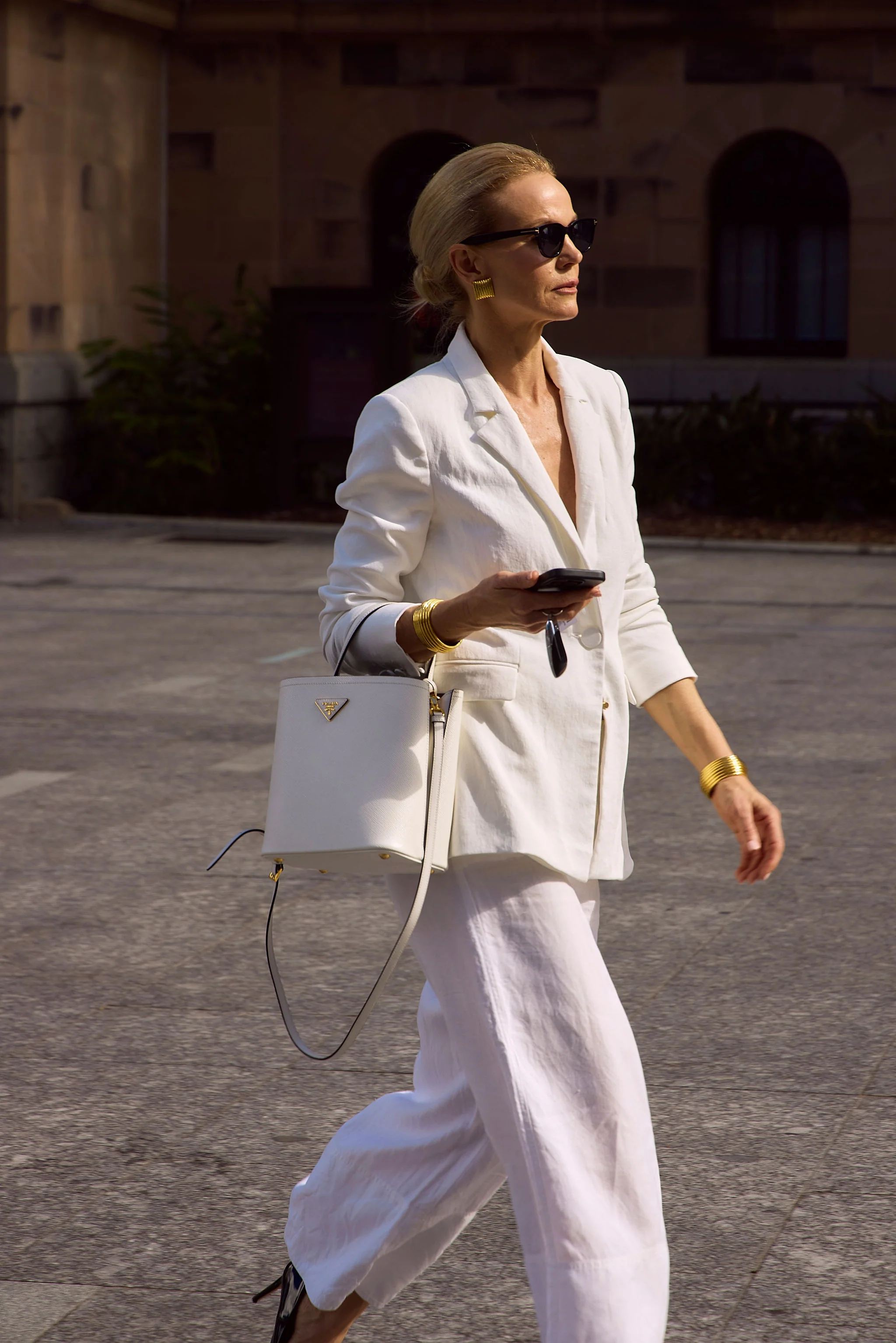 White suit — courtyard, golden hour